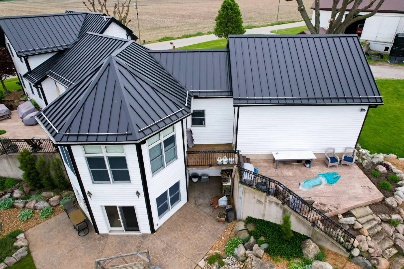 Tarping and dry-in on a Crooked Stick commercial roof